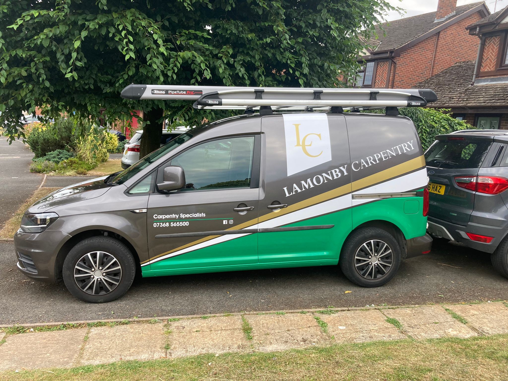 The Lamonby Carpentry van in charcoal, gold and green livery